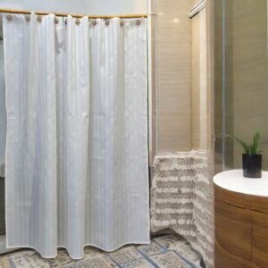 Cortina baño de teflon colgada en baño